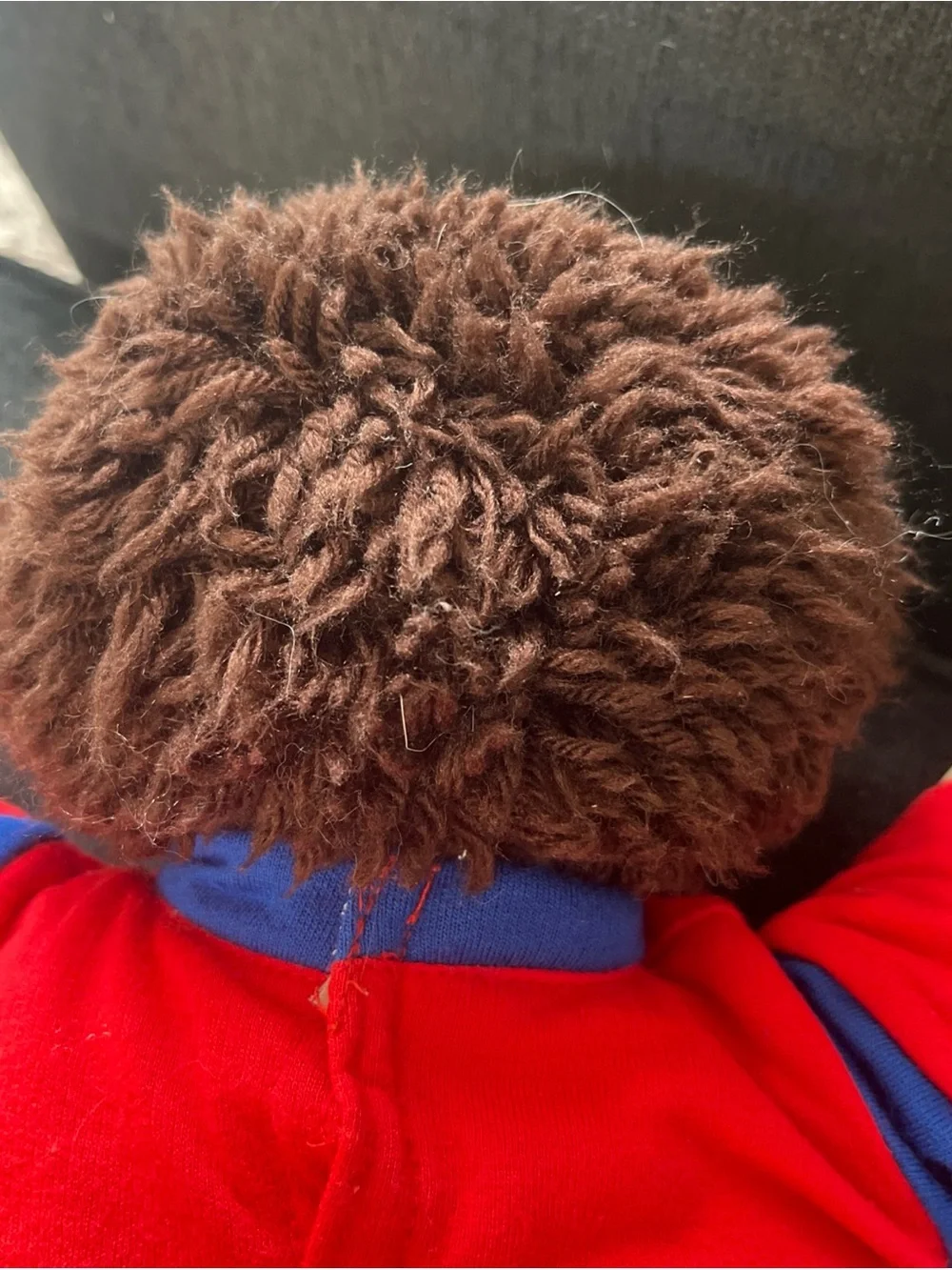 Cabbage Patch Kid with short clipped hair in sweats outfit